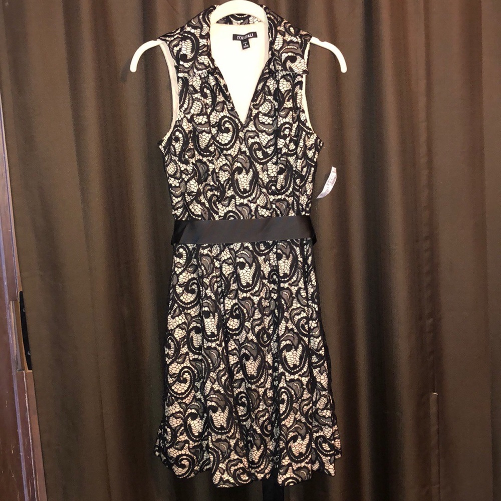 Beautiful black and cream lace dress.